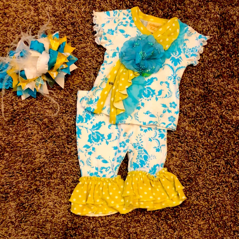Haute Baby outfit with matching headband.